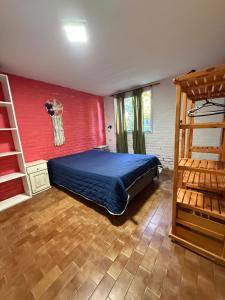 a bedroom with a bed and a basketball wall at Lo de Nery in Ostende