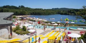 a group of people at a water park at Maison Saint-Pardoux in Friaudour