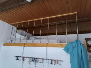 a bunk bed hanging from a ceiling with cords at Studio im Krater in Wallerstein