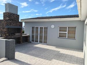 a rendering of a white house with a patio at The Lookout in Pearly Beach +24 photos