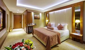 Cama o camas de una habitación en Buruciye Hotel