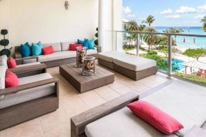 a living room with a view of the ocean at Superb 2 Bed Apartment in George Town