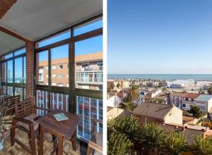 a balcony with a table and a view of the city at Apartment Malvarrosa Beach Cavite in Valencia
