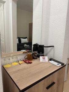 a counter in a room with a large mirror at Luxury Apartments Miranda in Ohrid +9 photos