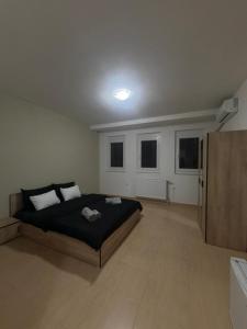 a bedroom with a large bed in a room at Luxury Apartments Miranda in Ohrid