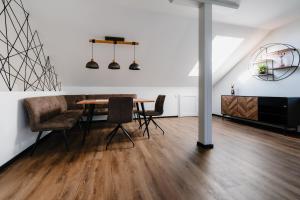 a dining room with a table and chairs at Seethal in Laufen