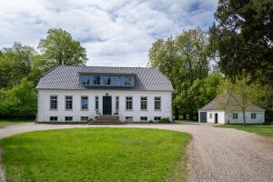 a white house with a window on top of it at Ferienwohnung Fehmarn in Fehmarn
