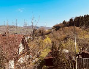 an old house sitting on top of a hill at FeWo Wanderlustig in Wolfstein