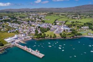 an aerial view of a harbor with boats in the water at Thrush Cottage in Schull