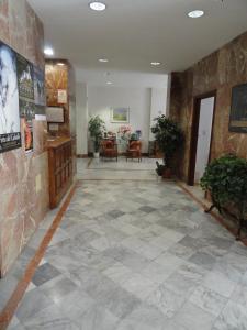 Vstupní hala nebo recepce v ubytování Hotel El Coloso