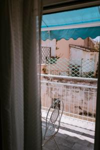 a view of a balcony from a window at Residenza Delle Sirene in Gaeta