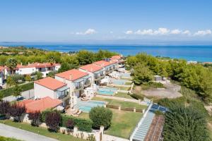 an aerial view of a house with a swimming pool at Spa Villa Sunny in Hanioti