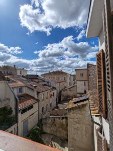 an aerial view of a city with buildings at Les toits du Lot in Villeneuve-sur-Lot