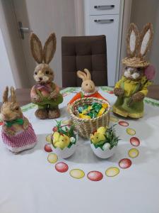 a group of stuffed animals sitting on a table at Park Apartment in Kočani