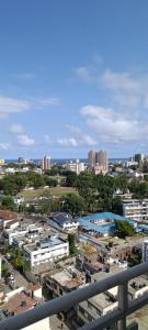 an aerial view of a city with buildings and trees at Blossom Homes A2 in Mombasa
