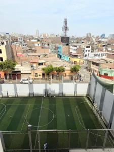 a tennis court on a soccer field in a city at City Center Lima in Lima