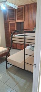a group of bunk beds in a room at Pascall's Luxury Homes Villa in Lambeau