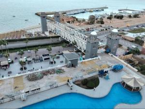 an aerial view of a bridge over a body of water at Porto El Sokhna in Ain Sokhna +11 photos