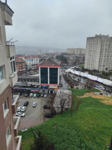a view of a parking lot in a city at Hostel in Yakuplu