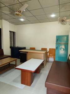 a room with benches and a table and chairs at Sky n Valley in Bāndarban