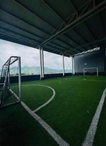 an empty soccer field with a soccer goal at Apartamento de 3 habitaciones al Norte de Armenia - excelente ubicación - parqueadero privado in Armenia +3 photos