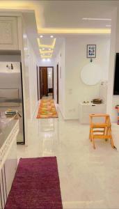a room with a kitchen and a living room at chalet - Plumar El Sokhna in Ain Sokhna
