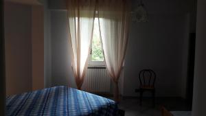 A bed or beds in a room at B&B Sun Garden