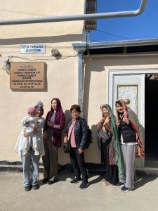 a group of women standing outside of a building at Guest house Lovely Guest in Bukhara