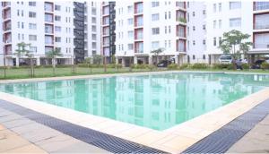 an empty swimming pool in a apartment building at Nyumbani in Nairobi