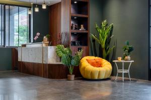 a lobby with a large pumpkin sitting next to a counter at Xi Mu in Taitung City