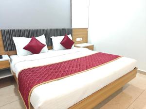 Llit o llits en una habitació de Hotel Vivank