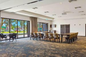 a conference room with a table and chairs at Quality Hotel Lakeside in Bendigo +96 photos