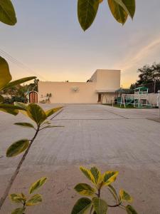 an empty parking lot in front of a building at Grand De Raj in Angeles
