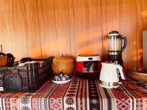 a table with a coffee maker and a blender at Sống Chill Homestay in Nam Yên