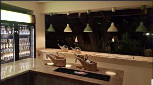 a bar with wicker baskets on a counter in a restaurant at So Dalyan in Ortaca