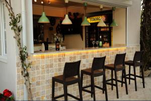 a group of chairs sitting at a bar at So Dalyan in Ortaca +27 photos