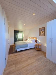 Llit o llits en una habitació de 2BR Appart confortable - Fast WiFi - Swiss Tech - EPFL - la RTS - l'UNIL - parking