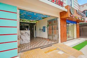 a building with a painting on the side of it at FabHotel Ultra Stay in Bhubaneshwar