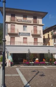 a hotel with a sign on the front of it at Moderno Albergo Didattico in San Pellegrino Terme +27 photos