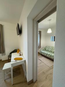 a room with a table and a bed at Agriturismo Belfiore in Castelnuovo Magra +30 photos