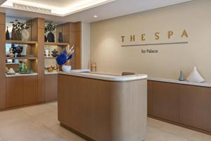a lobby of a store with a reception desk at Palace Beach Resort Fujairah in Fujairah