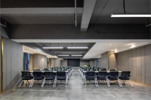 a conference room with tables and chairs in it at Atour Hotel Hefei Changjiang Road Zhixincheng Annongda in Hefei +57 photos