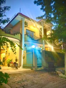 a house with a blue light on it at The Eastern Lodge in Islamabad