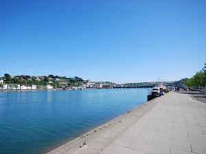 a large body of water with a sidewalk next to it at 1 Bed in Bideford oc-74817 in Bideford