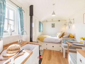 a small bedroom with a bed in the background at 1 Bed in Stockport oc-87592 in Mellor