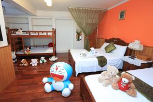 Una cama o camas en una habitación de Yilan Homeland B&B