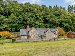 an old house with a fence in a field at 3 Bed in Presteigne oc-78336 in Evenjobb