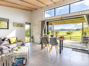 a living room with a couch and a table at 1 Bed in Llandrindod Wells oc-53194 in Llandrindod Wells