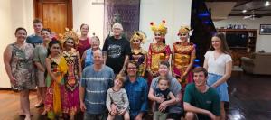 a group of people dressed in costumes posing for a picture at Camplung Beach Family Villa and Farmstead in Tejakula