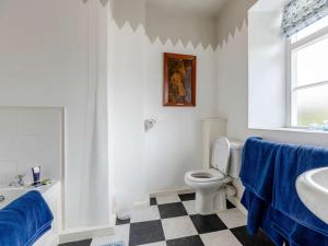a white bathroom with a toilet and a sink at 3 Bed in Ludlow oc-82889 in Ludlow +25 photos